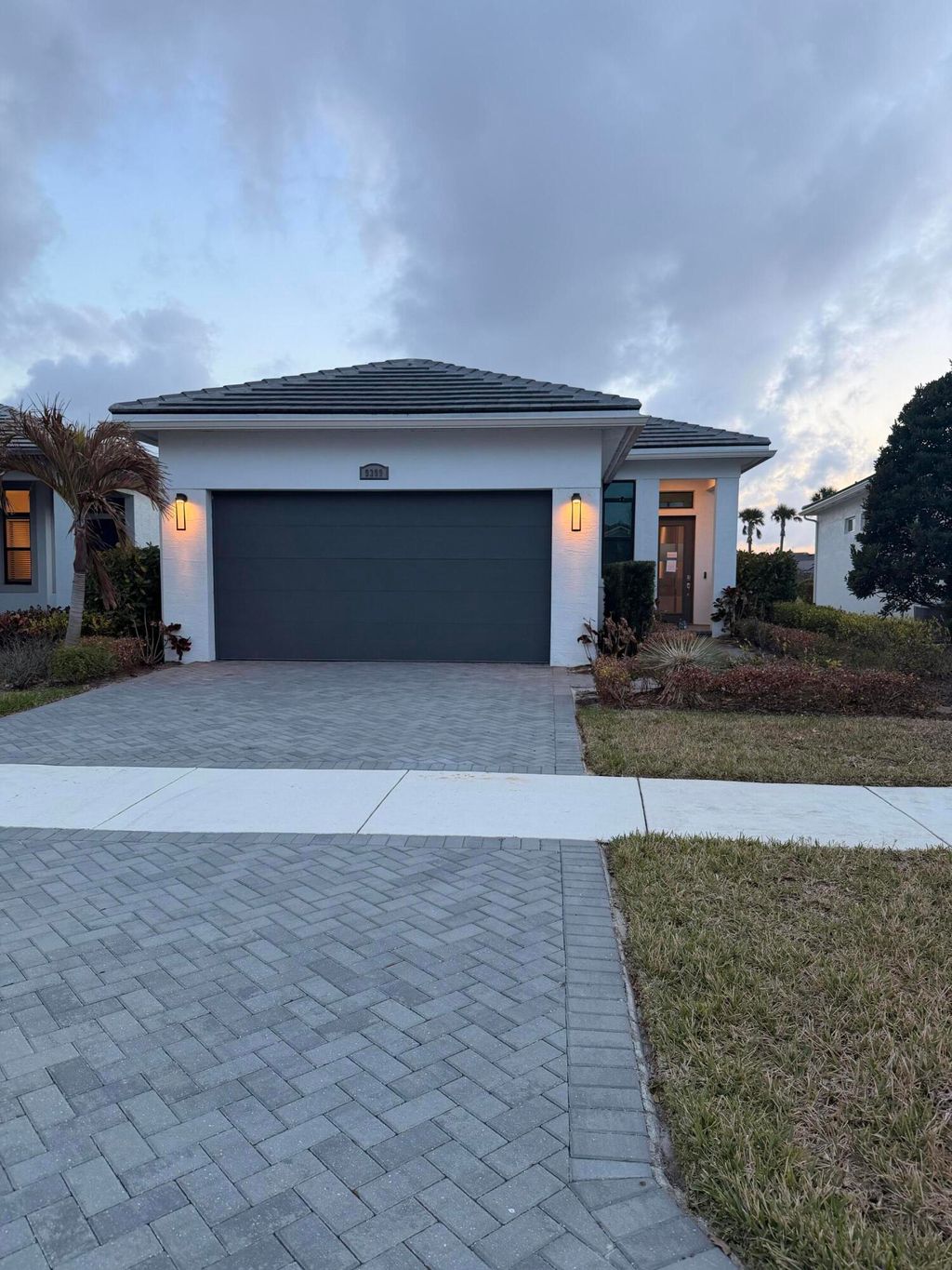 Photo of 9399 SW Pepoli Way, Port Saint Lucie, FL 34987 (MLS # B26001866)