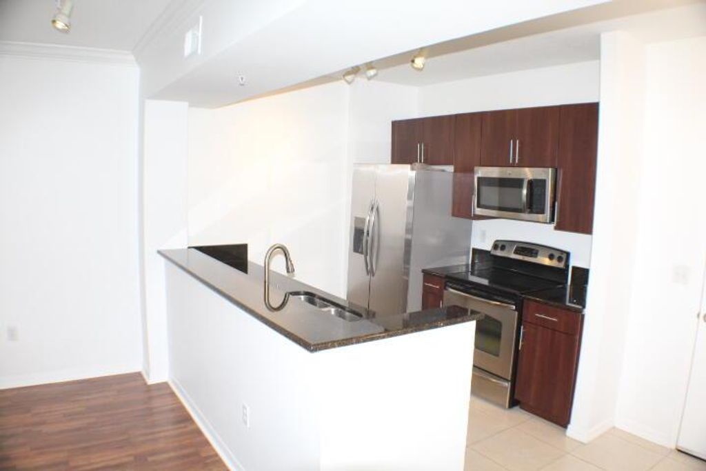 Photo of 4907 Midtown Lane #1312, Palm Beach Gardens, FL 33418 (MLS # R11079423)