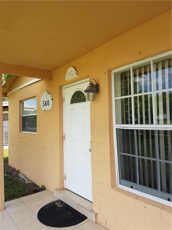 Photo of 560 NW 2nd Way, Deerfield Beach, FL 33441 (MLS # F10301201)