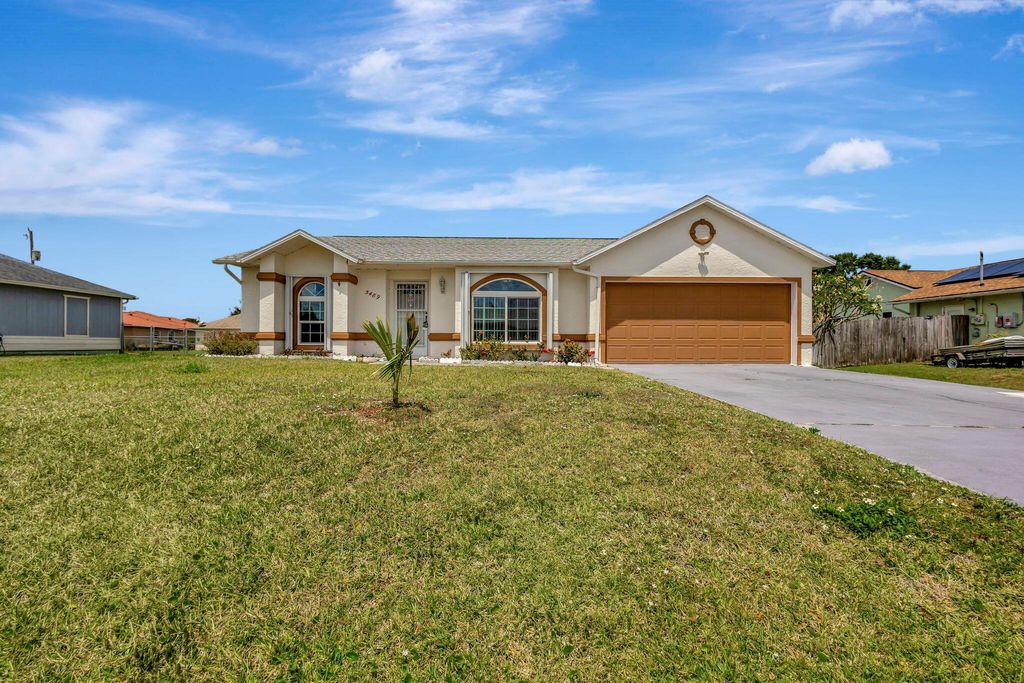 Photo of 5489 NW Evanston Avenue, Port Saint Lucie, FL 34983 (MLS # R11083696)