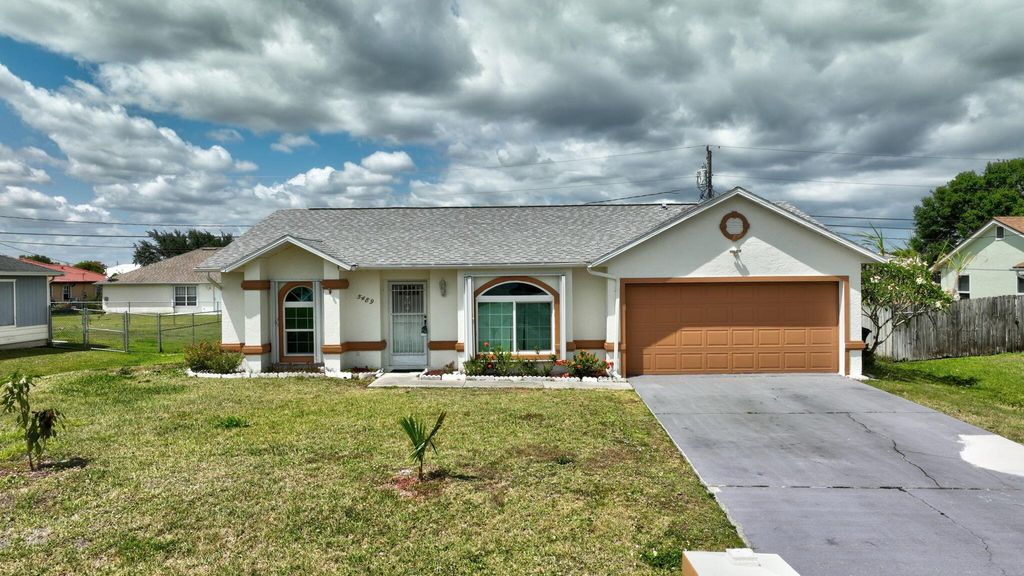 Photo of 5489 NW Evanston Avenue, Port Saint Lucie, FL 34983 (MLS # R11083696)