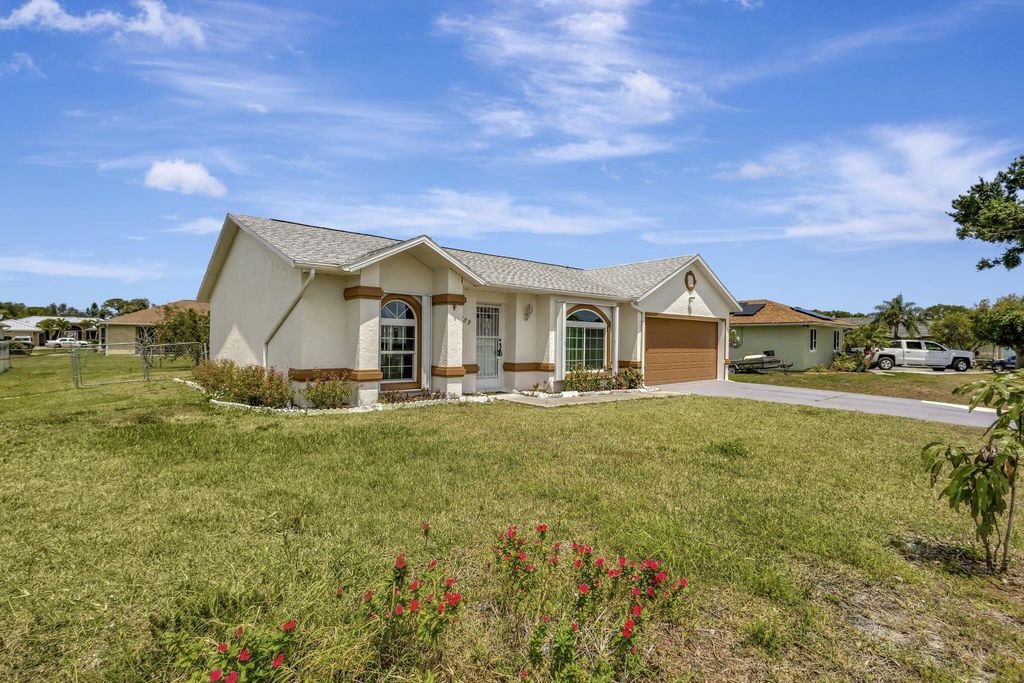 Photo of 5489 NW Evanston Avenue, Port Saint Lucie, FL 34983 (MLS # R11083696)