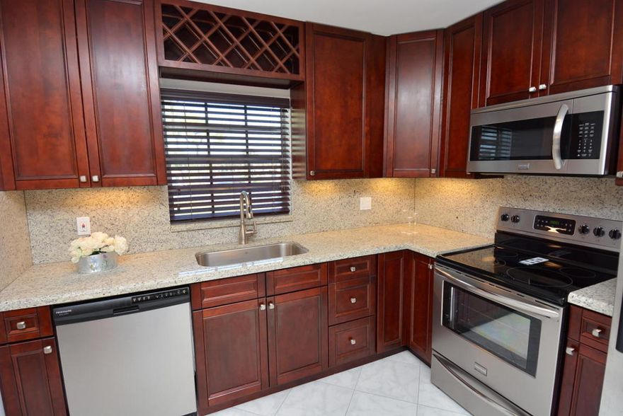 One of a kind! Elegant corner unit, 10 min from the beach. This luxurious unit has been renovated from top to bottom. New appliances, washer and dryer. Tons of light and closets. Enjoy Florida's sunsets from your own screened porch! Gated community has a community pool, tennis courts, club house, and more!55+ Community.