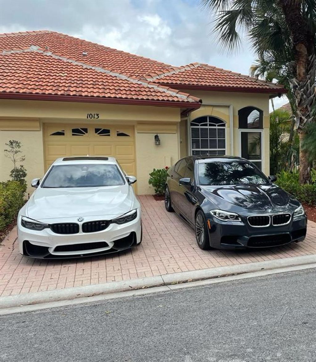 Photo of 1013 Via Jardin, Riviera Beach, FL 33418 (MLS # R10710276)