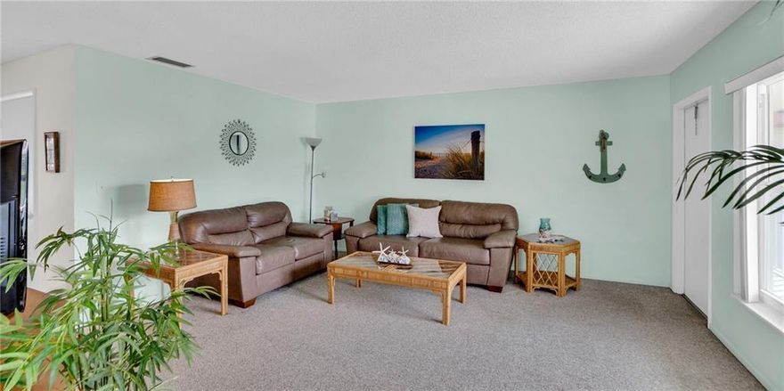 Turnkey 2BR/2BA condo in Vista Royale w/a bright, beachy feel & peaceful golf views. This unit features hurricane-impact windows throughout, except for the sliders/lanai, along w/a '23 A/C + '22 water heater. Furniture included, making this the perfect move-in-ready seasonal retreat, year-round residence, or investment opportunity. Residents enjoy resort-style living along a scenic 27-hole golf course just minutes from beaches, shopping, dining, & entertainment. Community amenities include 4 clubhouses, heated pools, fitness center, tennis & pickleball courts, a full social calendar & more!