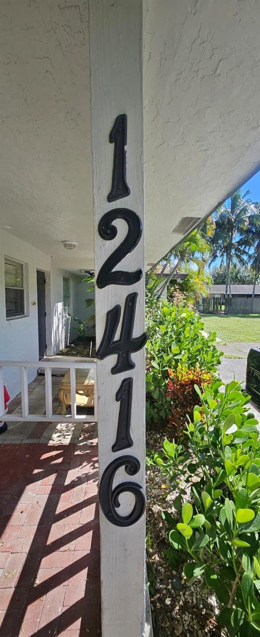 Move in ready. Tile throughout. Private fenced rear yard and front porch add a homey feel. Tray ceiling in the kitchen. Washer & dryer in the second bath. Cul de sac. Close to Wellington Mall. Wellington schools.
