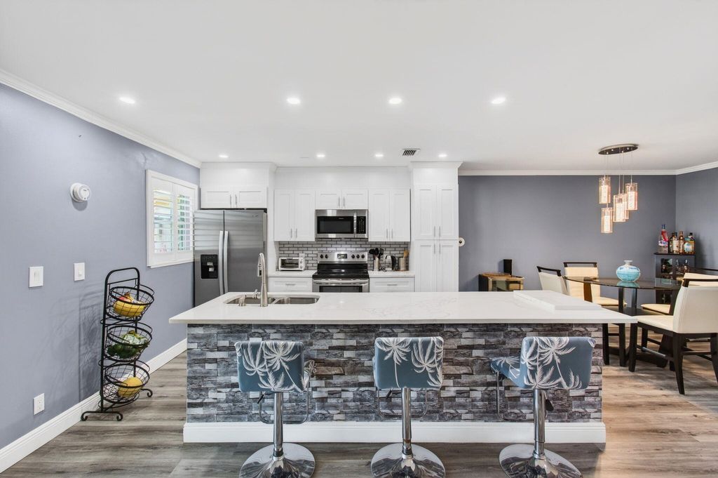 Photo of 1320 High Point Place S #C, Delray Beach, FL 33445 (MLS # R11155859)