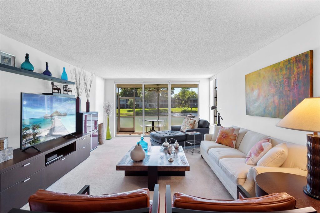 Photo of 4240 Oaks Terrace #105, Pompano Beach, FL 33069 (MLS # B26032209)