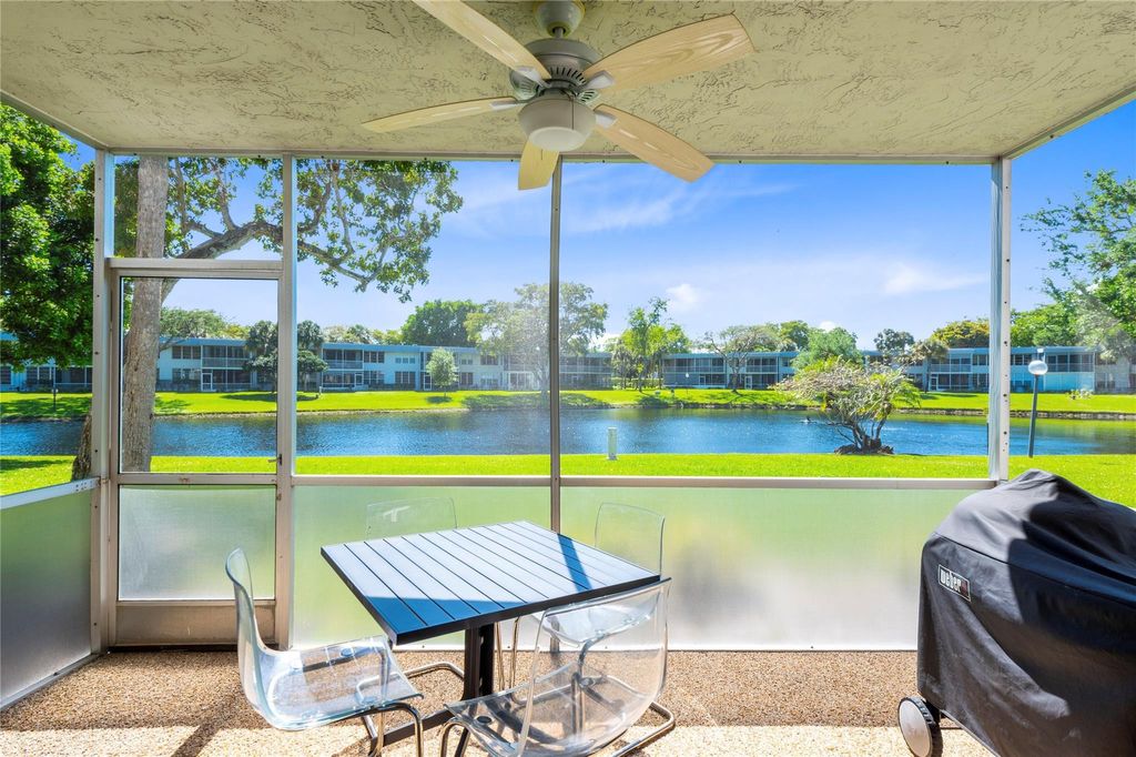 Photo of 4240 Oaks Terrace #105, Pompano Beach, FL 33069 (MLS # B26032209)