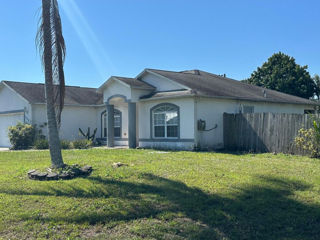 Photo of 1602 SE Biddle Lane, Port Saint Lucie, FL 34983 (MLS # R11070941)
