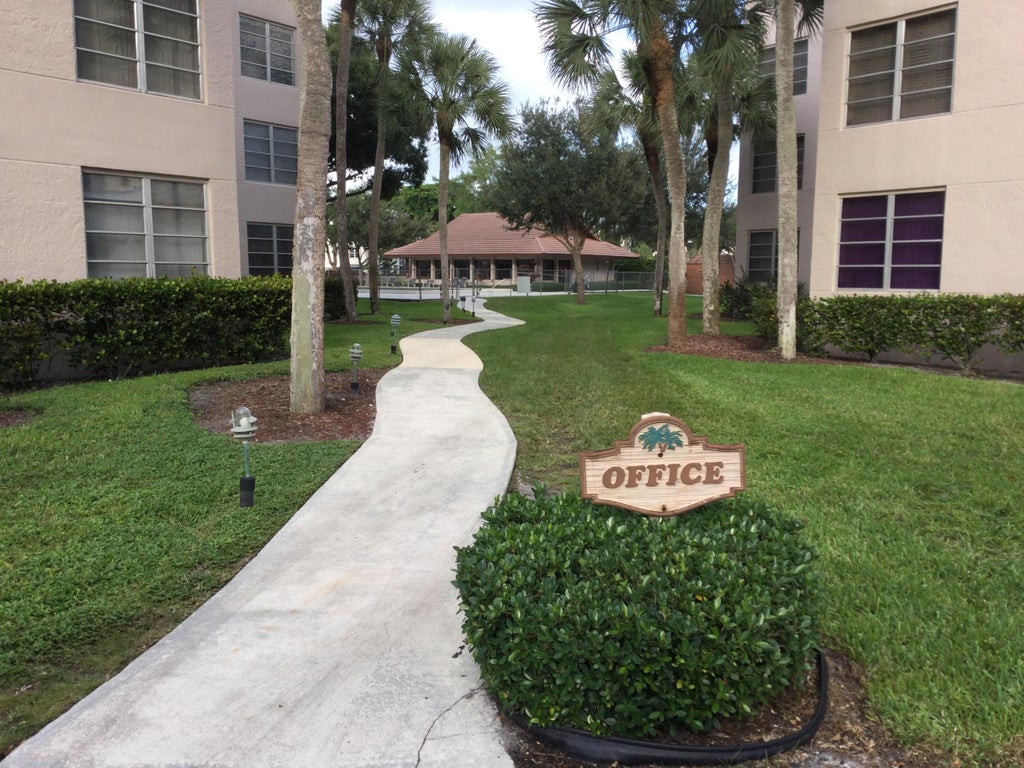Photo of 1920 Sabal Palm Drive #Apt 105, Davie, FL 33324 (MLS # B26093009)