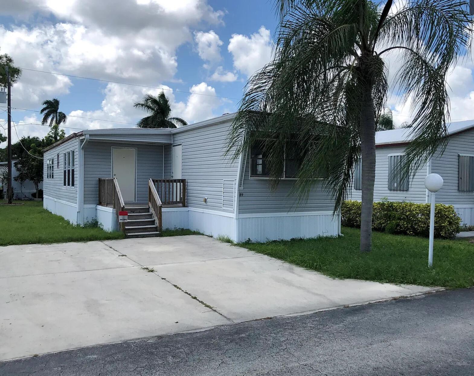 Beautiful and spacious 2 bed, 2 bath double-wide mobile home located in a quiet and friendly 55+ community. This move-in-ready home is ideally positioned near the entrance for easy access and convenience. It offers ample parking with a double-wide driveway. Inside, you'll find fresh paint and a clean, well-maintained interior ready for your personal touch. The community features fantastic amenities, including a sparkling pool with stunning lake views. Don't miss this opportunity to own a comfortable and peaceful home in a welcoming neighborhood!Mobile Home Dealer License DH/1117396/1.Cash Only!