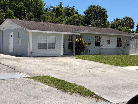 Photo of 928 Fitch Drive, West Palm Beach, FL 33415 (MLS # B26026314)