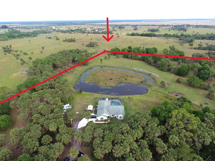 16 +/- Acres in this Beautiful Ranchette off Carlton Road that has a long private road that leads you to a home and split into 2 parcels. The house is on 4.91 Acres with a house and pool, and part of the pond is Homesteaded, and 11.24 Acres surrounds the almost 5 Acres and is AG exempted and has cattle on this part of the property. The house has 3 Bedroom, 2 Bath, 2 Car Garage CBS home with a screened in pool. Enjoy country living at its best and away from the city limits. This home has a split plan with 2000 sq feet under air and is clean with Tile floors throughout the house. Formal living and dining and a Large Family room with a working wood burning fireplace just off the Kitchen.  Kitchen has Granite Count tops and SS Large Master Bedroom offers a large walk-in closet, and a Large safe that leads to the cabana Bathroom with new doors that opens to the pool area. The French Doors open to the pool enclosed area with an awning that overlooks the large pond that is stocked with different kinds of fish and a fountain. You can have your own farm animals, cows, horses and chickens in the mixed pasture and wooded area. There is a shed and multiple buildings all with electric that can hold your feeds, and farming equipment as well as a large metal building 18x36.
