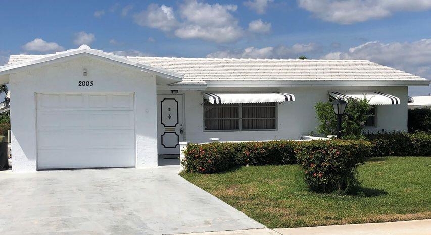 Welcome to this spacious single-family home nestled in a peaceful 55+ community--just steps from the clubhouse and nestle close to local shops and restaurants. This 2-bedroom, 2 full bath home features a generous layout with a 1-car garage and sits on a desirable  large corner lot with plenty of natural light. While the home retains its original charm, the owner offers a rare opportunity: the flexibility to make it your own. Whether it's different paint, decor, or light updates, you're welcome to personalize the space to suit your style.Enjoy an active and relaxed lifestyle with full access to the nearby clubhouse amenities, including a swimming pool, golf, gym, shuffleboard courts, and billiard table.