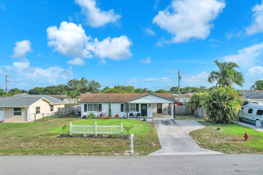 Photo of 3314 Plaza Place, Lake Worth, FL 33462 (MLS # R11093138)
