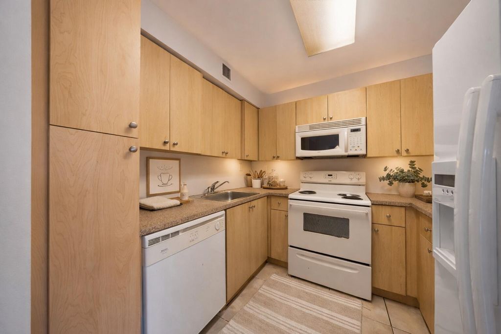 Photo of 2809 N Course Drive #205, Pompano Beach, FL 33069 (MLS # B26018027)