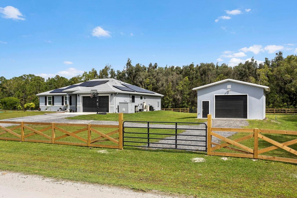 Photo of 12669 71st Place N, The Acreage, FL 33412 (MLS # R10976217)