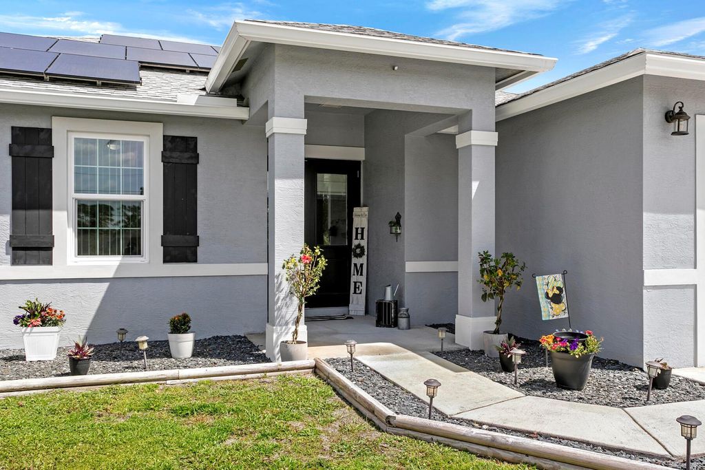 Photo of 12669 71st Place N, The Acreage, FL 33412 (MLS # R10976217)