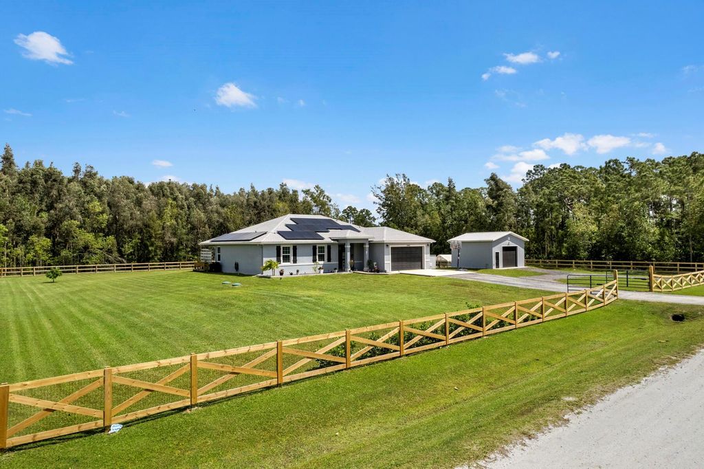 Photo of 12669 71st Place N, The Acreage, FL 33412 (MLS # R10976217)