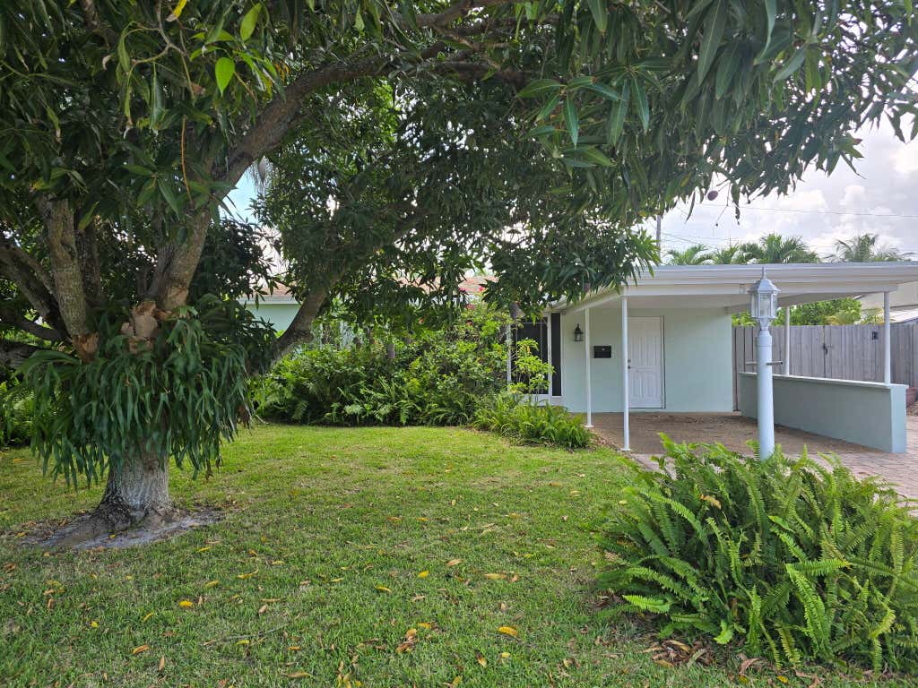 Photo of 5631 NE 5th Avenue, Oakland Park, FL 33334 (MLS # B26041433)