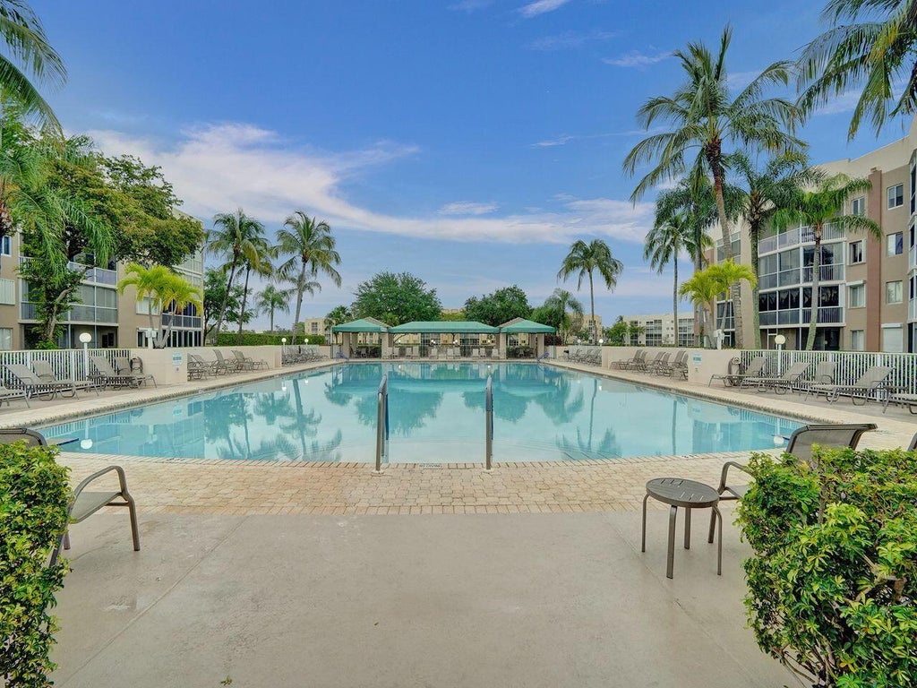 Photo of 7411 GRANVILLE Drive #106, Tamarac, FL 33321 (MLS # B26068734)