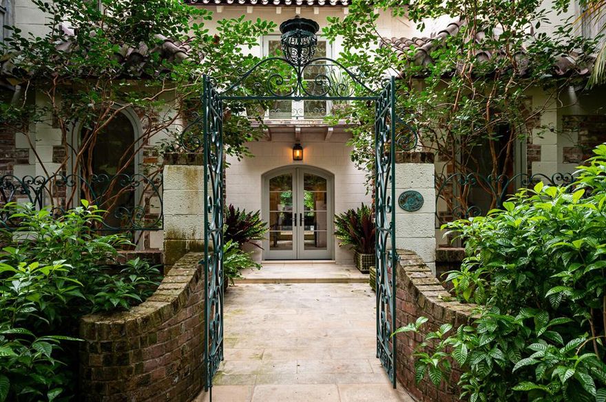 Architecturally significant, renovated landmarked property in historic, extremely desirable, Phipps Plaza. The house was originally designed by Belford Schoumate-who came to south Florida in the 1930's and designed and/ or renovated more than 1500 buildings-he actually lived and had his office in Phipps Plaza. The property was redesigned by Jeff Smith Architectural Firm-all new systems to include plumbing, electrical, A/C, new roof, all impact windows and doors- updated in 2014. Full of charm and in pristine condition-Gourmet kitchen-top of the line appliances, exceptional finishes-2 master suites- Waterworks fixtures and Herpel Tile in the bathrooms-4 fireplaces, balconies and a large patio overlooking the pool and screened in cabana. Mario Navarro, a prominent Palm Beach landscape architect, designed the outdoor space. Conveniently located in the center of Palm Beach, near Worth Avenue, The Breakers and the Lake Trail-on a private, quiet cul- de- sac. A true GEM!