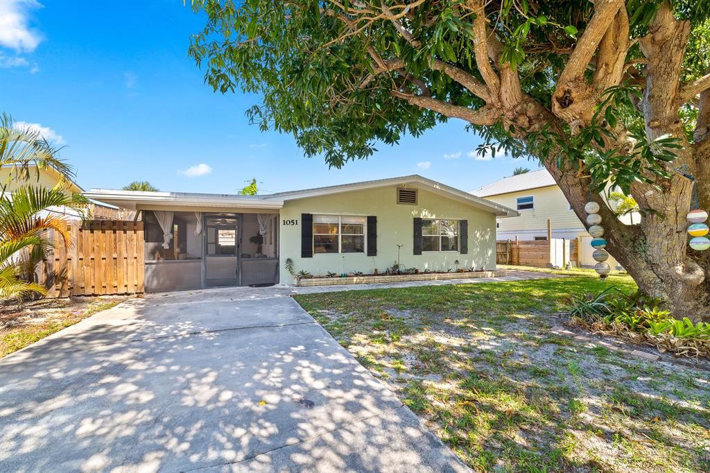 Photo of 1051 NE Glass Drive, Jensen Beach, FL 34957 (MLS # R10880977)