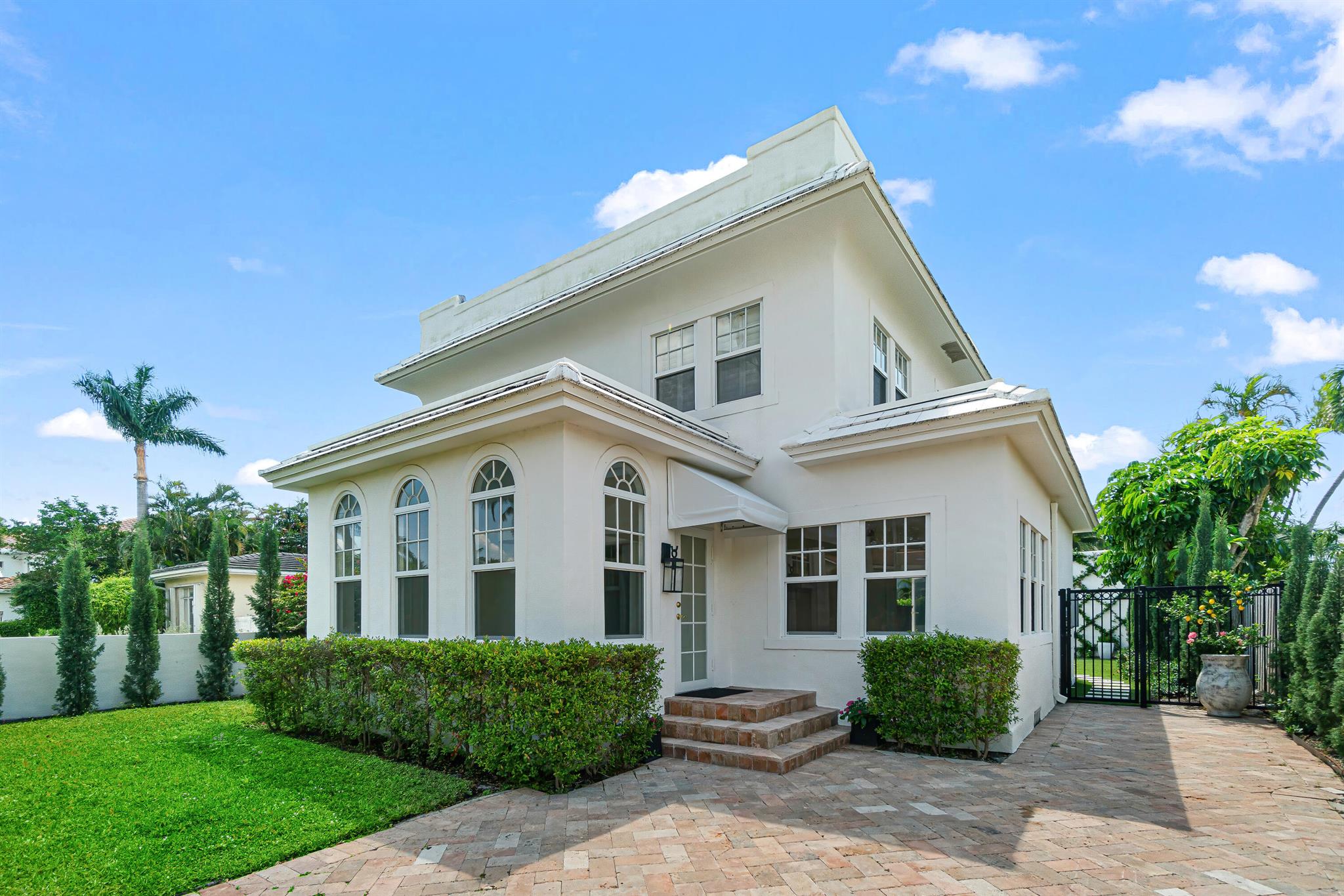 Tastefully renovated five bedroom property is available for annual lease, unfurnished. This gated property features beautiful outdoor space with pool and jacuzzi/fountain. The two story main house includes three bedrooms and three baths, bright living room, formal dining room, upgraded kitchen. The Guest house offers additional flex living space includes One bedroom/bath Guest suite with living area and kitchen, and a separate one bedroom/cabana and bath.