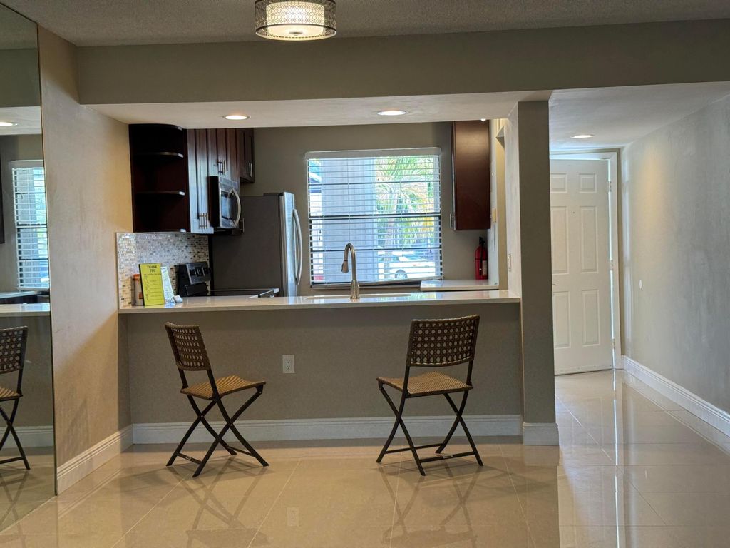 Photo of 3521 Village Boulevard #103, West Palm Beach, FL 33409 (MLS # B26020569)