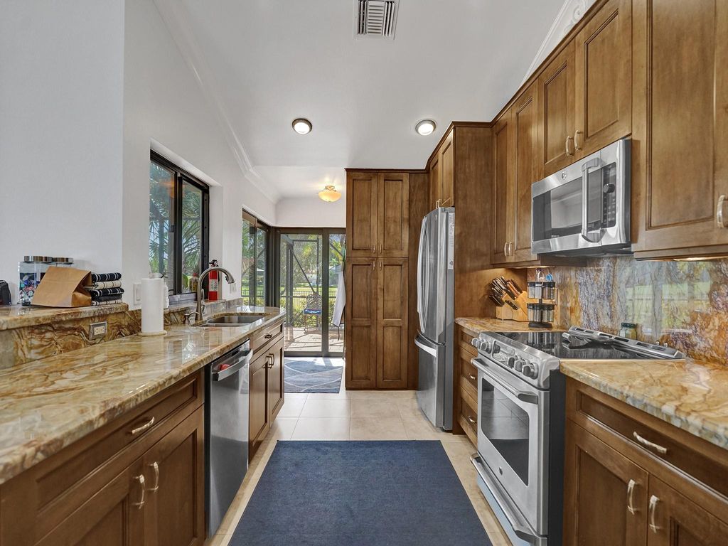 Photo of 11157 Boca Woods Ln, Boca Raton, FL 33428 (MLS # F10413957)