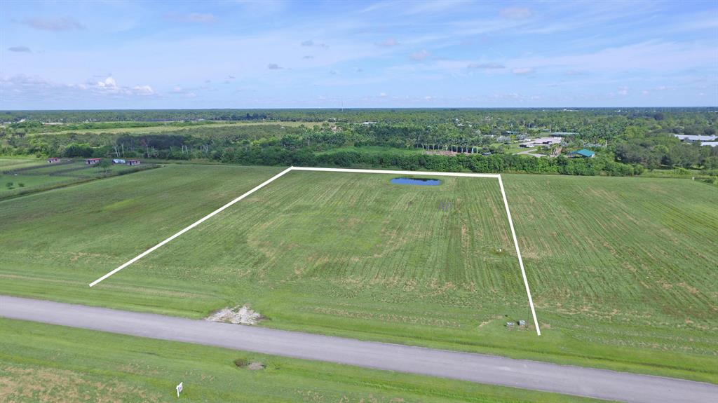 5 acres ready to build you dream home in gated equestrian community conveniently located in Palm City near schools, shopping and an easy commute north or south. Property improvements include pond, electric, well, culvert and some fill. Meadow Run offers paved roads and deeded bridle trails.