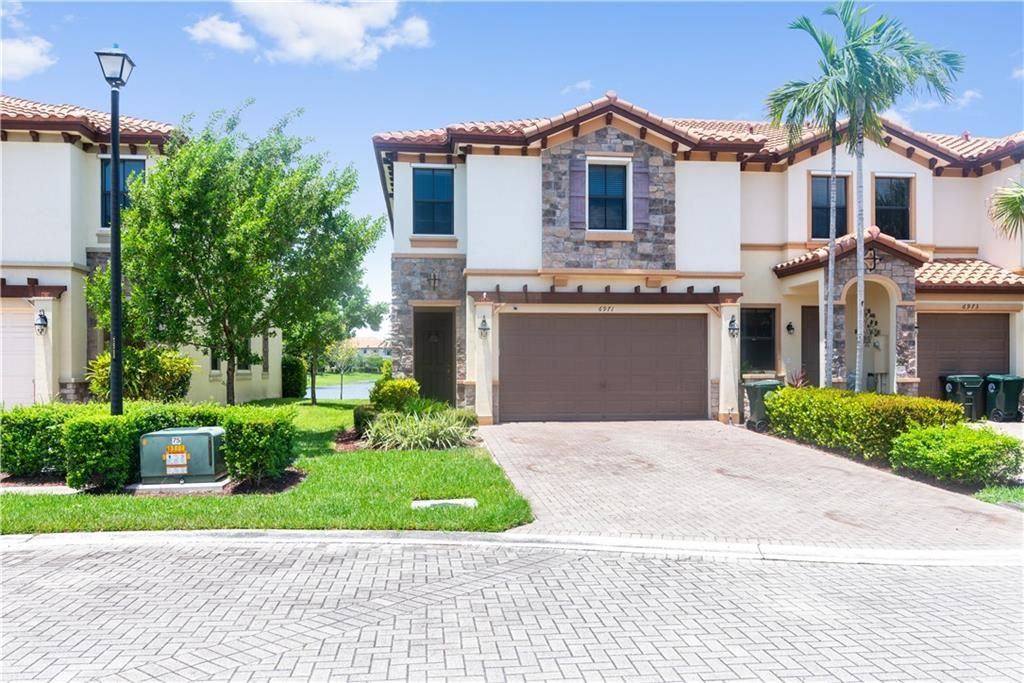 Photo of 6971 Halton Park Ln #6971, Coconut Creek, FL 33073 (MLS # F10295495)