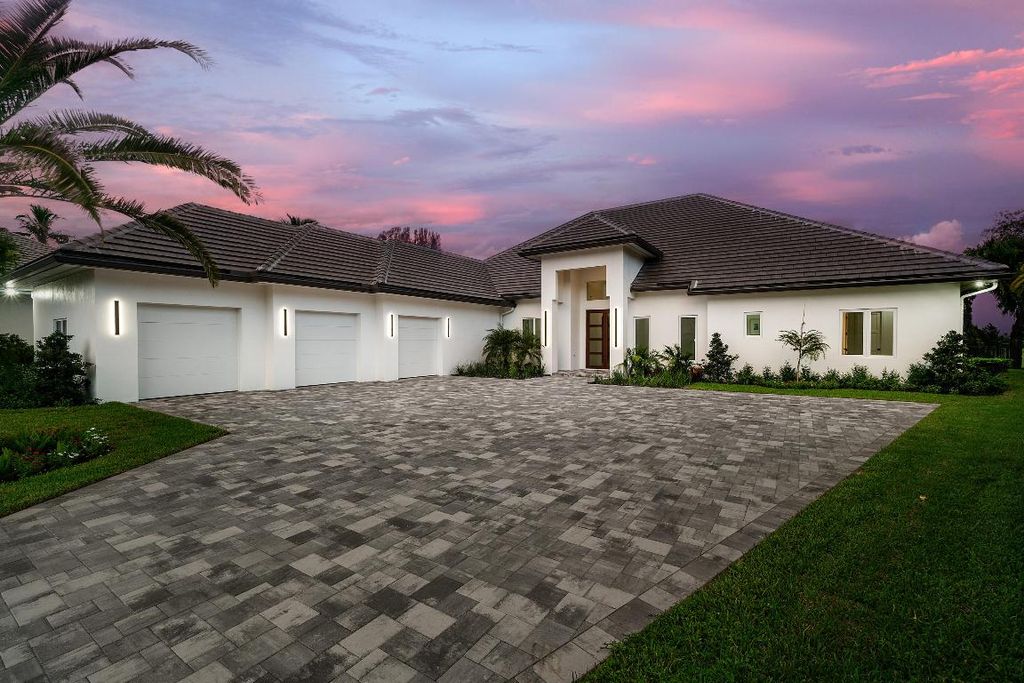 Photo of 100 Glenbrook Court, Atlantis, FL 33462 (MLS # R11124887)