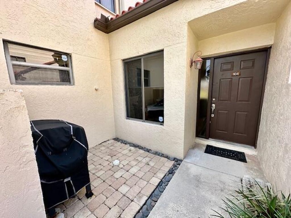 Photo of 16 Via De Casas Sur #104, Boynton Beach, FL 33426 (MLS # R10985460)