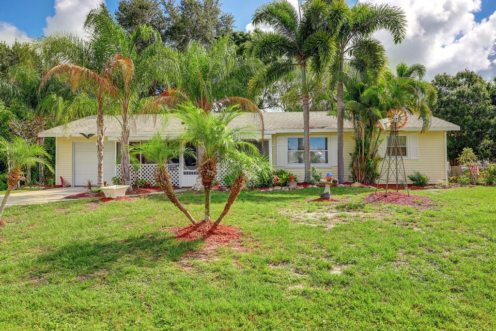 Photo of 1685 SW Cecelia Lane Ln, Port Saint Lucie, FL 34953 (MLS # R10814685)