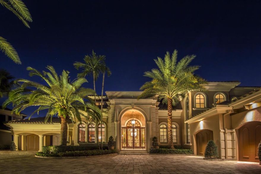 ONLY a Social Membership! Updated and pristine, this sprawling 13,000+ sq. ft. Estate Home allows for complete privacy, & amazing views of golf and water.  6 bdrm./7.5 baths are carefully divided into 3 sections of the estate, perfect for the unique living situations of today's family. On the main floor you have the Formal Living Room with fireplace, Formal Dining Room, Casual Dining and huge Family Room open to a double island gourmet Kitchen, 400 bottle Wine Cellar, Office, Billiard Room, Media Room, a 2 bdrm. Guest House, Summer Kitchen, heated lap Pool, Spa, Lanai, A.C. 3 car & golf cart garage. The second floor is the Owner's Retreat with golf and water views! Also a living area with a fireplace, His & Hers bathrooms & closets, and a Gym. You must see to appreciate this amazing Estate