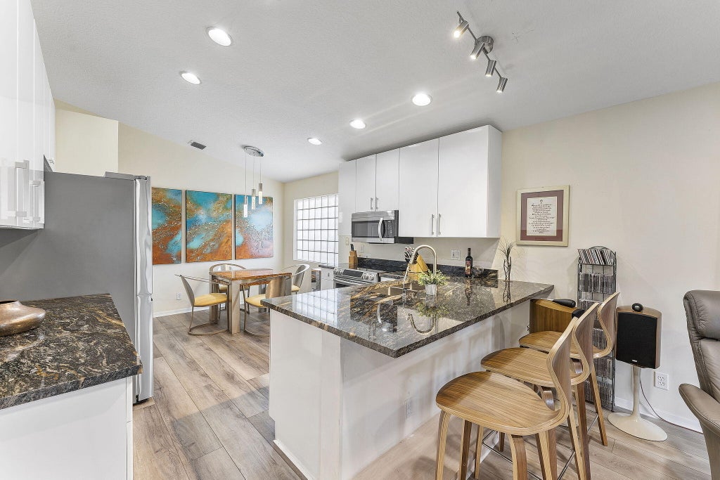 Photo of 12092 APRILIA Drive, Boynton Beach, FL 33437 (MLS # B26085117)