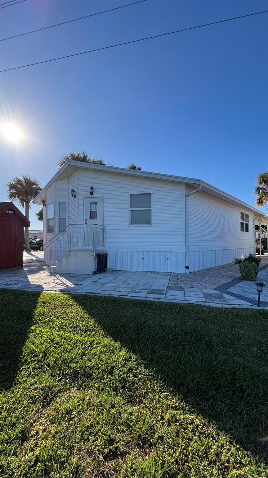 Beautiful and move in ready. This 2-bedroom 2 bath home is ready for your South Florida get away. Fully furnished inside and out, even includes golfcart and vehicle. Adjoins a pond within the community and within just a few minutes from Lake Okeechobee.