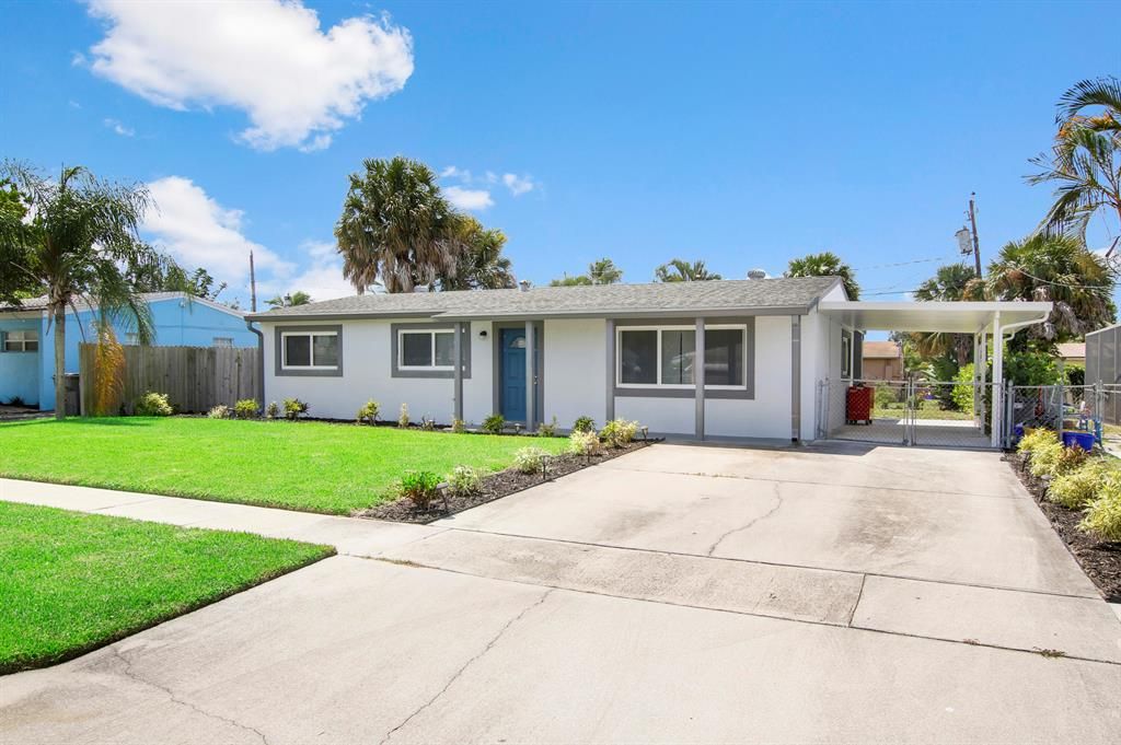 Photo of 9491 Bloomfield Drive Dr, Palm Beach Gardens, FL 33410 (MLS # R10830630)