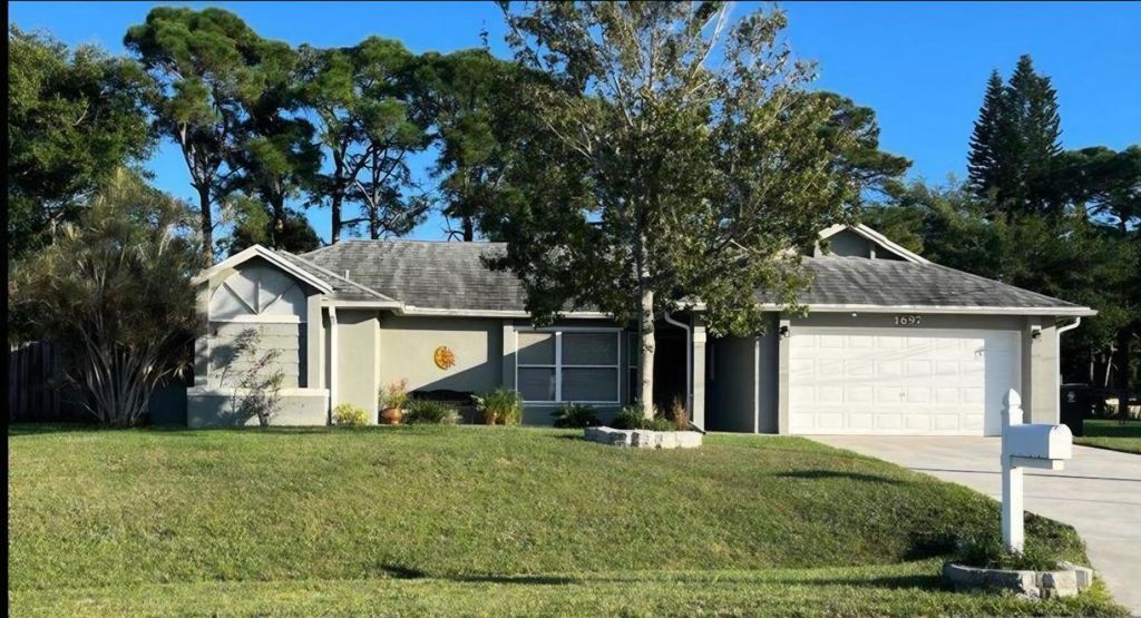 Photo of 1697 SW Clover Street, Port Saint Lucie, FL 34953 (MLS # R11135680)