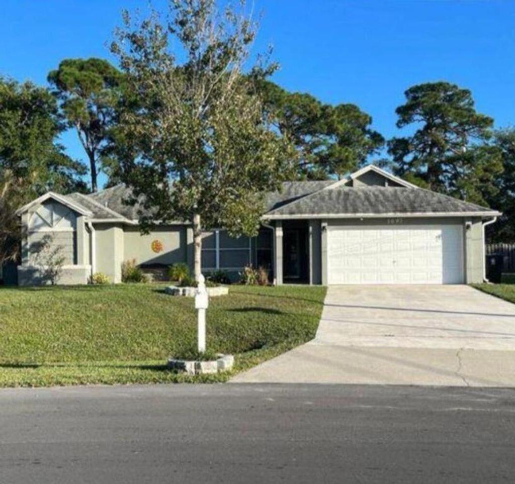Photo of 1697 SW Clover Street, Port Saint Lucie, FL 34953 (MLS # R11135680)