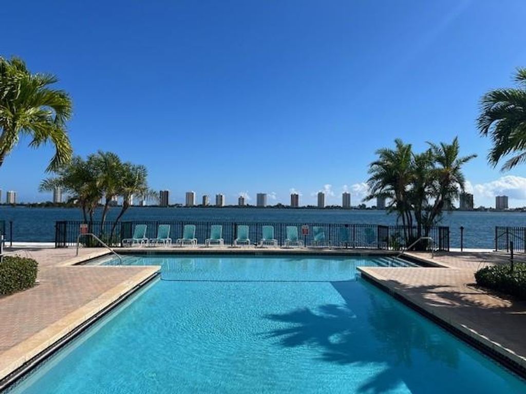 Photo of 1140 Lake Shore Drive #206, Lake Park, FL 33403 (MLS # B26035817)