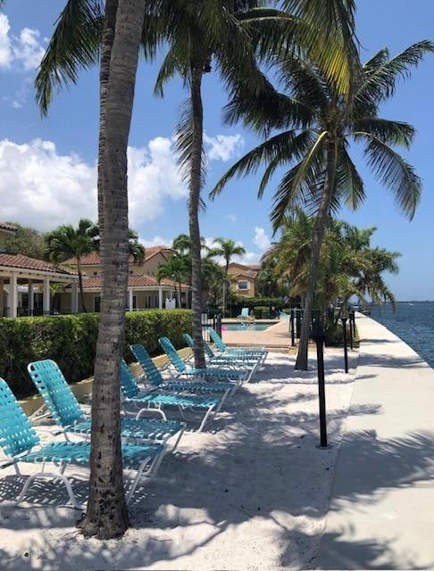 Photo of 1140 Lake Shore Drive #206, Lake Park, FL 33403 (MLS # B26035817)