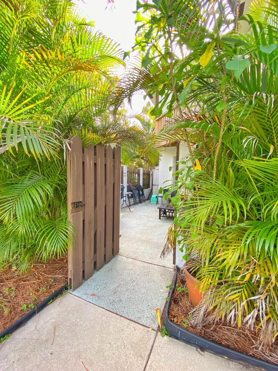 Beautiful European style townhome with tile and amazing wood floors. Centrally located with spacious bedrooms, Roman tub, standup shower, walk-in closet. Calm and serene community with beautiful trees lining the drive. Amazing community pool for friends and family to enjoy. Balcony over looking private courtyard patio. This amazing townhome priced to sell, is waiting for you to call it home.
