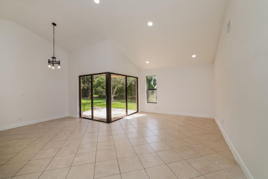 Photo of 5134 NW 42nd Terrace, Coconut Creek, FL 33073 (MLS # B26008543)