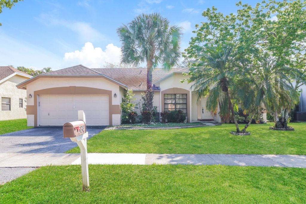 Photo of 5134 NW 42nd Terrace, Coconut Creek, FL 33073 (MLS # B26008543)