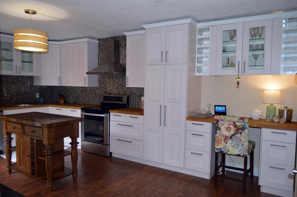 Enjoy this spacious floor plan of 1,686 square feet in a gated, well-maintained community with widespread green space shaded by mature oak trees. The private Zen patio includes raised flowerbeds and plenty of room for outdoor living. The updated kitchen is a homeowners dream with gorgeous white cabinets, stainless steel appliances and marble backsplash. This unit has been completely remodeled and features an open floor plan (with room to add a third bedroom or office). The master bedroom includes a large walk-in closet and room for so much more. This home has accordion shutters for hurricane protection. Minutes to downtown West Palm Beach, easy access to I-95, and walking distance to Whole Foods and the Palm Beach Outlet Mall. Indoor and outdoor furniture negotiable.