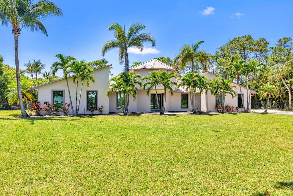 Photo of 14409 66th Trail N, Palm Beach Gardens, FL 33418 (MLS # R11091139)