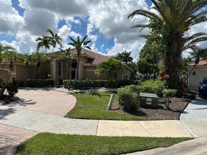 Executive residence. Beautiful single story on a Lake Lot, professional landscaped, like new condition, 4 bed rooms, 3.5 baths 2 car garaged with a in-ground heated pool, water treatment threw-out home, New HVAC with duct work Treatment, Newer roof, Spacious family room overlooking pool & screened patio area. Formal Dining area with a professional layout eat-in kitchen off to the side with White profile appliances. Children can enjoy AAA school system from elementary through High School. Thirty minutes to the Airport or the beaches or just go enjoy the Hard Rock Hotel or our various sports arenas just 30min. away. Go on a cruise no problem 30min to Port Everglades or 45 min to the Port of Miami or the International Airport.
